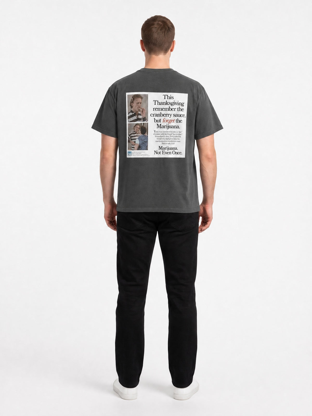 AI-generated model, no real person pictured. Happy Thanksgiving oversized faded tee in faded black, back view.