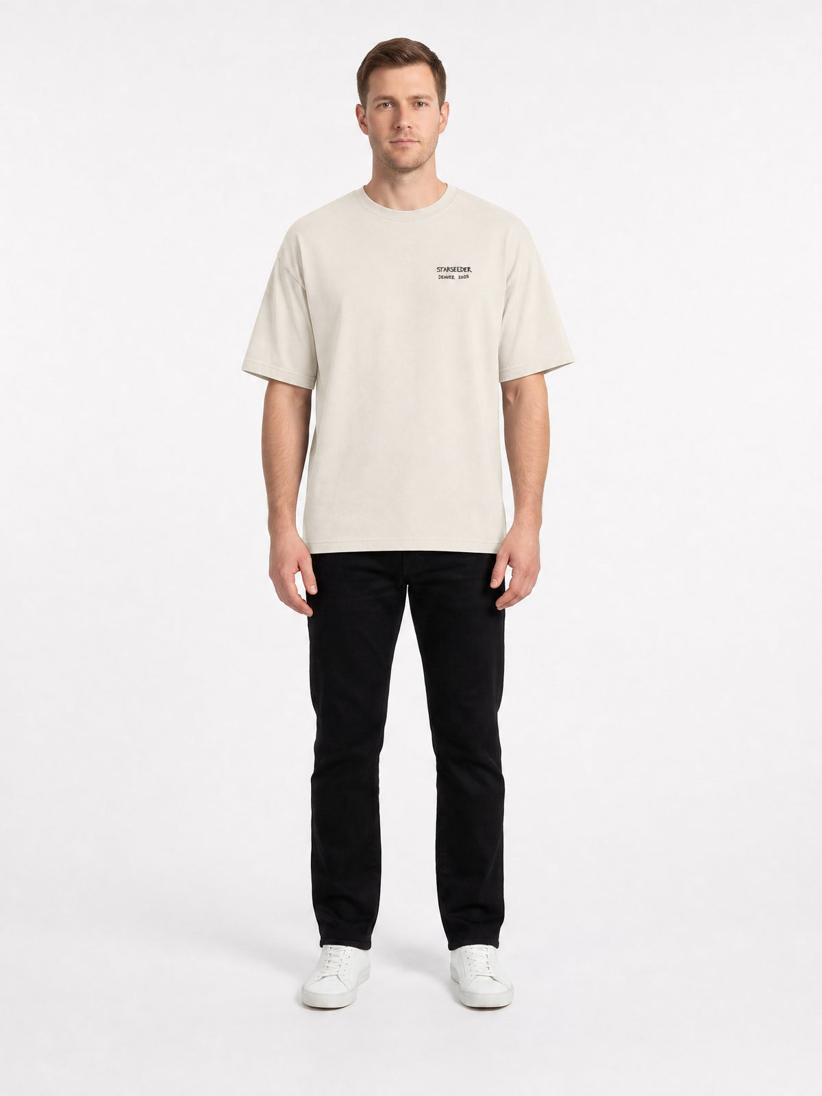 AI-generated model, no real person pictured. Happy Thanksgiving oversized faded tee in faded bone, front view.
