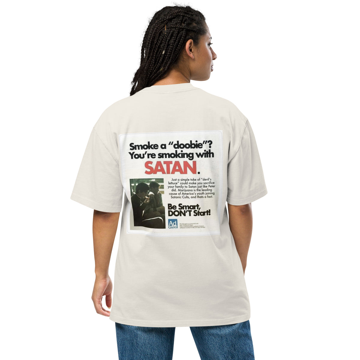 Not Even Once oversized faded tee in faded bone, back view on a women's studio model (Printful mockup)