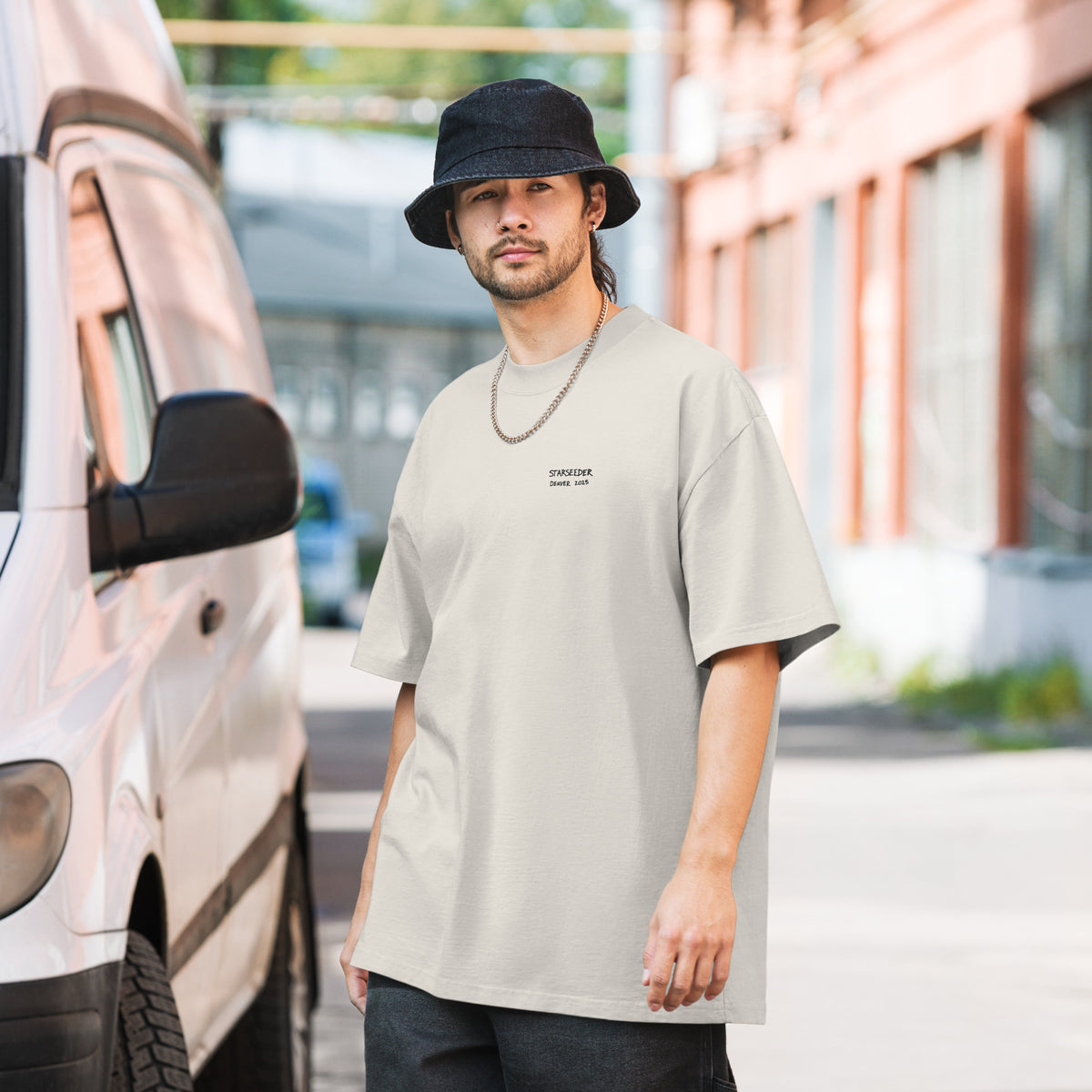 Not Even Once oversized faded tee in faded bone, front view on a men's lifestyle model (Printful mockup)