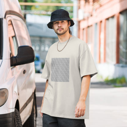 Take Me To Your Leader oversized faded tee in faded bone, front view on a men's lifestyle model (Printful mockup)