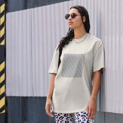 Take Me To Your Leader oversized faded tee in faded bone, front view on a women's lifestyle model (Printful mockup)