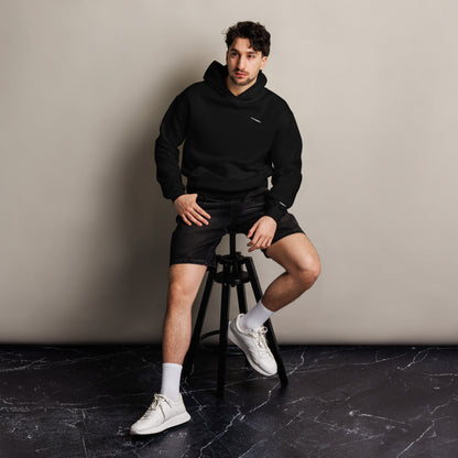 H?rd Day unisex oversized hoodie in black, front view on a men's lifestyle model (Printful mockup)